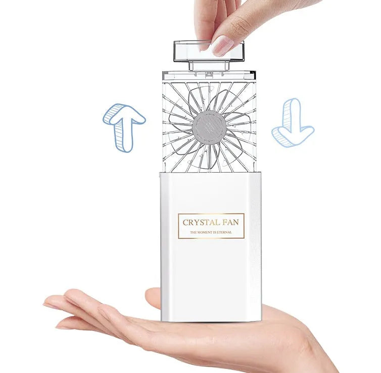 Pink handheld perfume fan with rechargeable battery for fragrance application