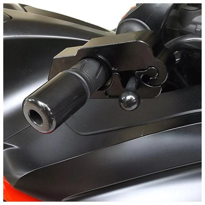 Black motorcycle handlebar lock with CNC aluminium body and stainless steel wire, shown attached to brake lever