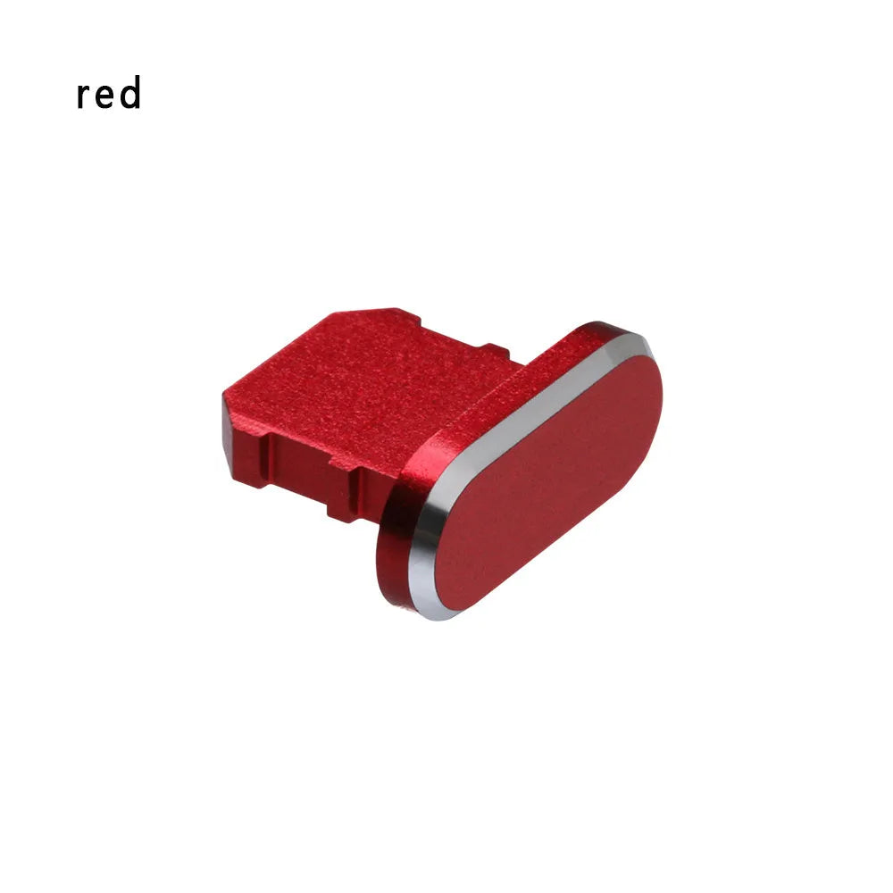 Aluminium alloy iPhone charging port dust plug in multiple colours including gold, silver, blue, red, grey, black, and rose gold.