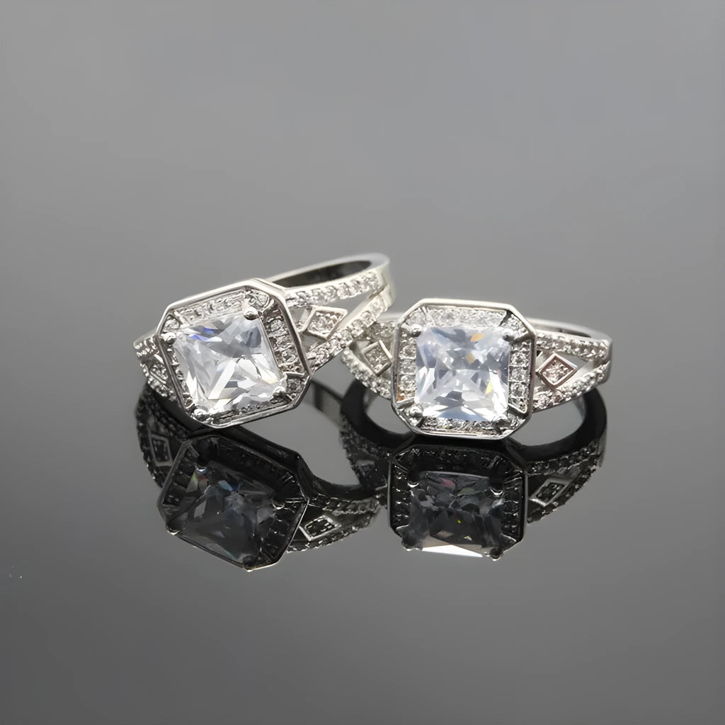 Geometric women's zircon ring with hollow design and platinum-colour finish shown from multiple angles