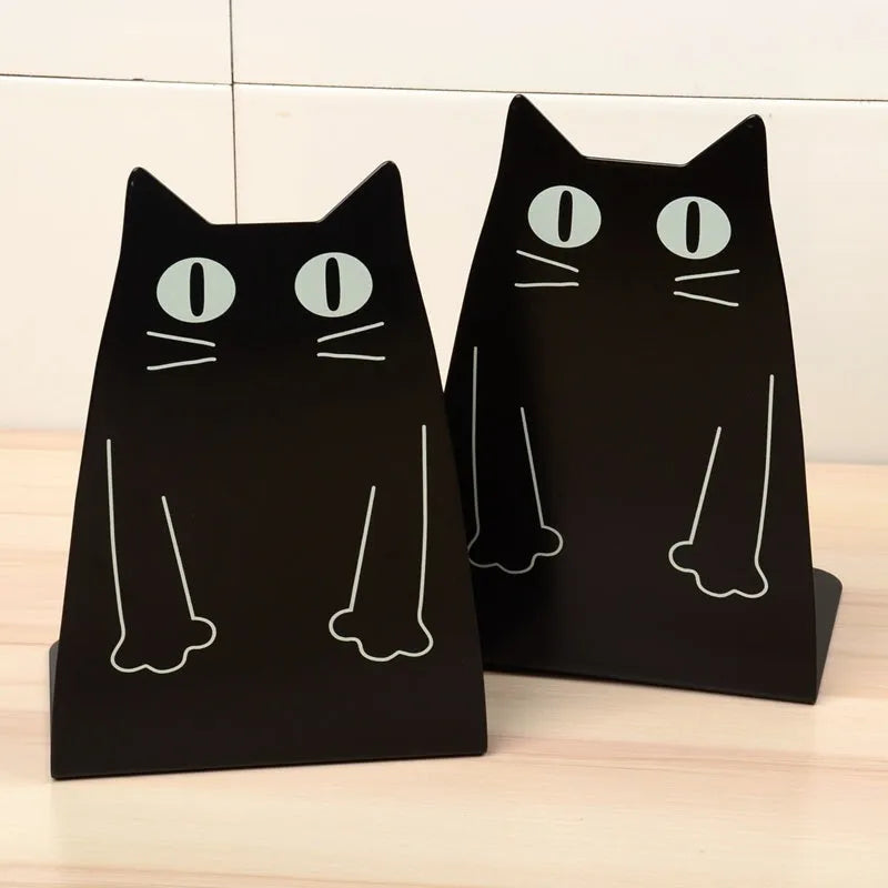 Pair of blue iron bookends 14 x 20.5 x 10.5cm holding books upright on a shelf
