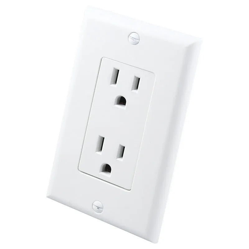 White plug-in socket induction night light installed in a UK wall socket, showing a soft glow from the integrated LEDs.