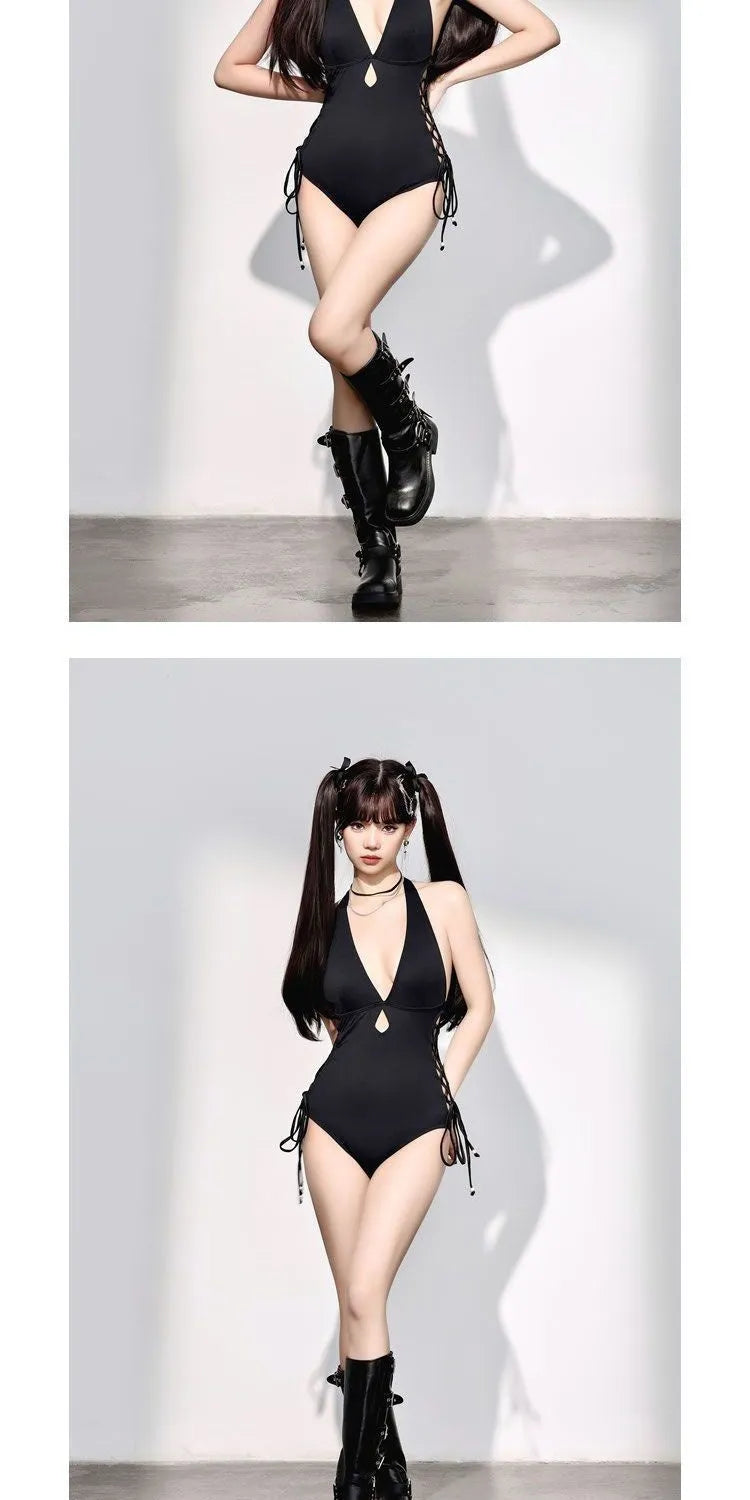 Black women's one-piece swimsuit with V-neck and hollow strap detail.