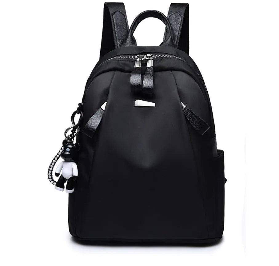 Medium wine red Oxford cloth rucksack with two straps and a front pocket