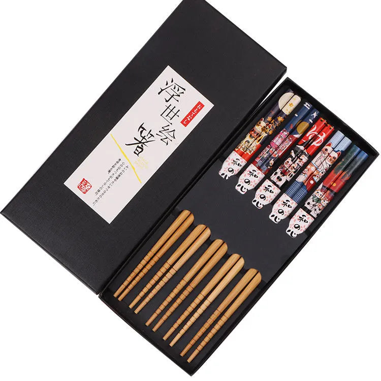 Set of five pairs of bamboo chopsticks with Japanese lucky cat and elegant blue cartoon patterns.