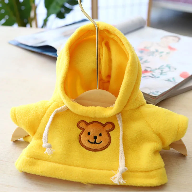 A blue cloth hoodie sweater for a small dog, showing the hood up.