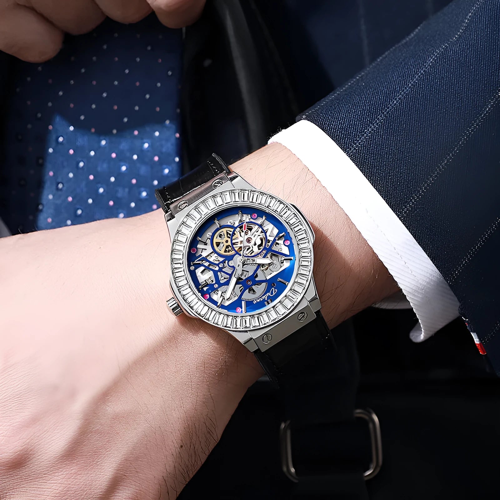 Automatic men's watch with diamond studded hollow dial in a white case.