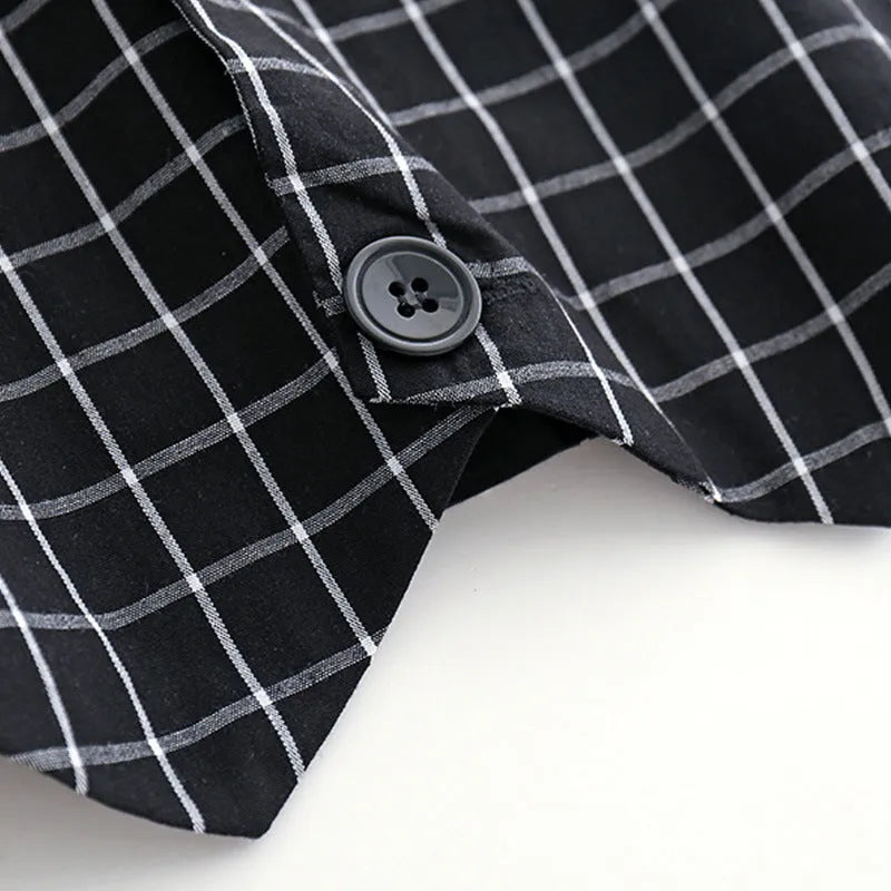 Boys casual two-piece cotton pants suit set in black with shirt and trousers on child model