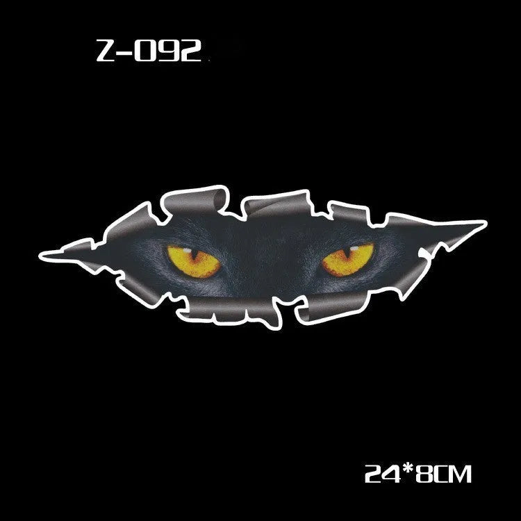 Pair of reflective cartoon eye car stickers for rearview mirrors on a white background