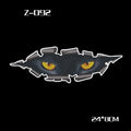 Pair of reflective cartoon eye car stickers for rearview mirrors on a white background