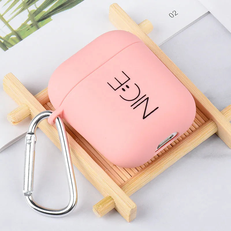 Polycarbonate AirPods case cover with floral and emoticon decorative designs in black and pink colour options
