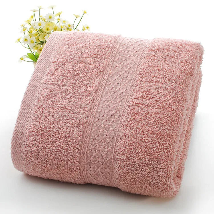 Thickened cotton blend bath and beach towel showing colour options including green, blue and brown variations
