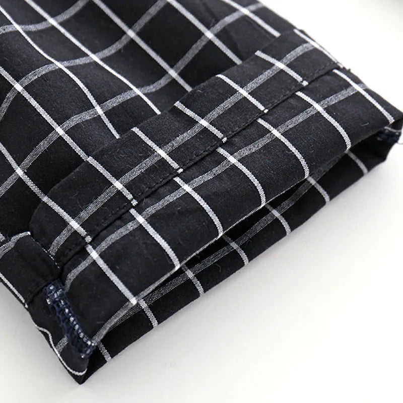Boys casual two-piece cotton pants suit set in black with shirt and trousers on child model