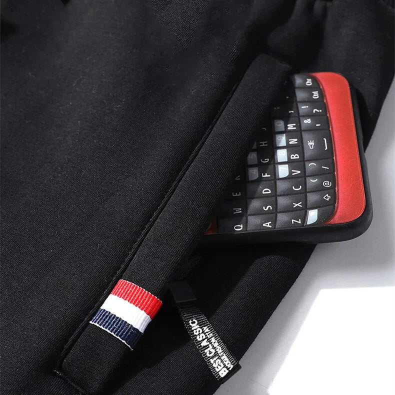 Men's casual loose straight-leg cotton-look sweatpants with fleece lining in black, front view