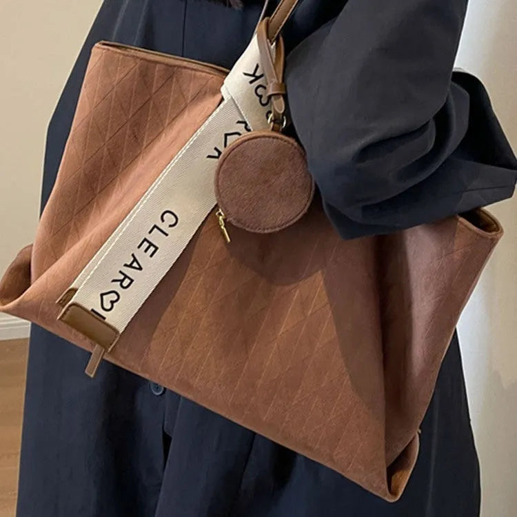 Large soft polyester shoulder tote bag in horizontal square shape with zippered internal compartment