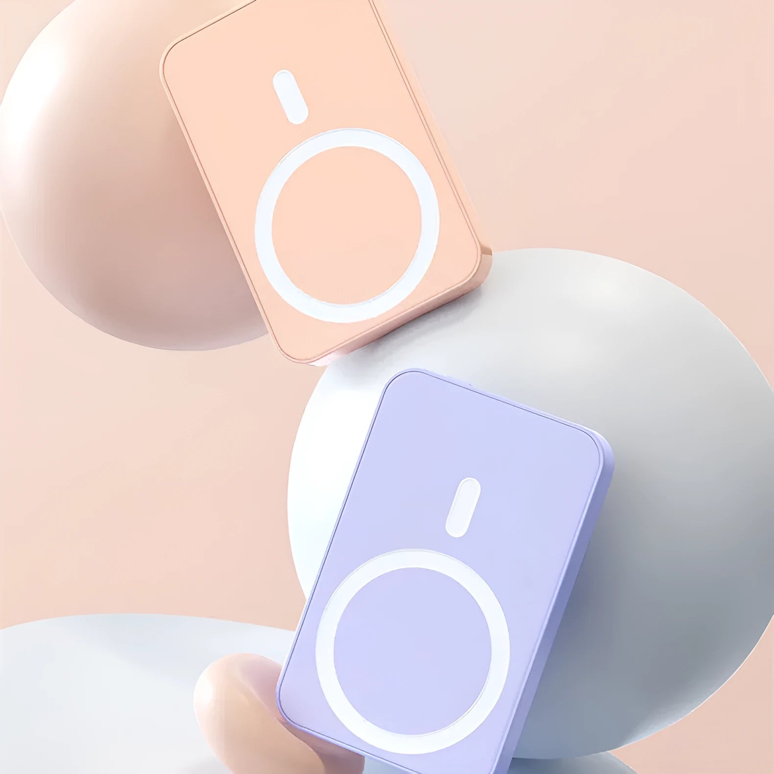 Pink magnetic wireless power bank showing dimensions and plastic shell.