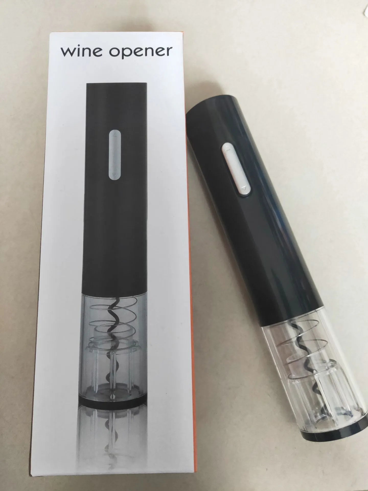 Automatic electric wine bottle opener with foil cutter in red, black, or white colour options.