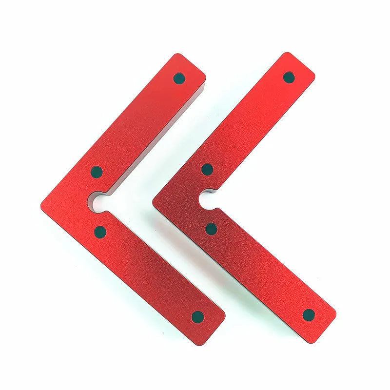 Machined aluminium right angle positioning block for woodworking jigs, showing 90-degree internal corner and scale.