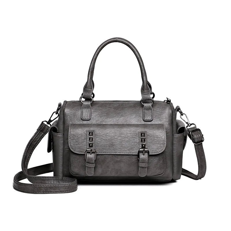 Vintage-style large capacity messenger bag in PU leather, showing contrast stitching and a horizontal square shape.