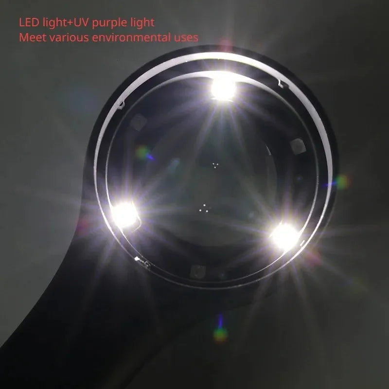 Black and silver electronic magnifying glass for jewellery appraisal with 30X lens and USB C cable.