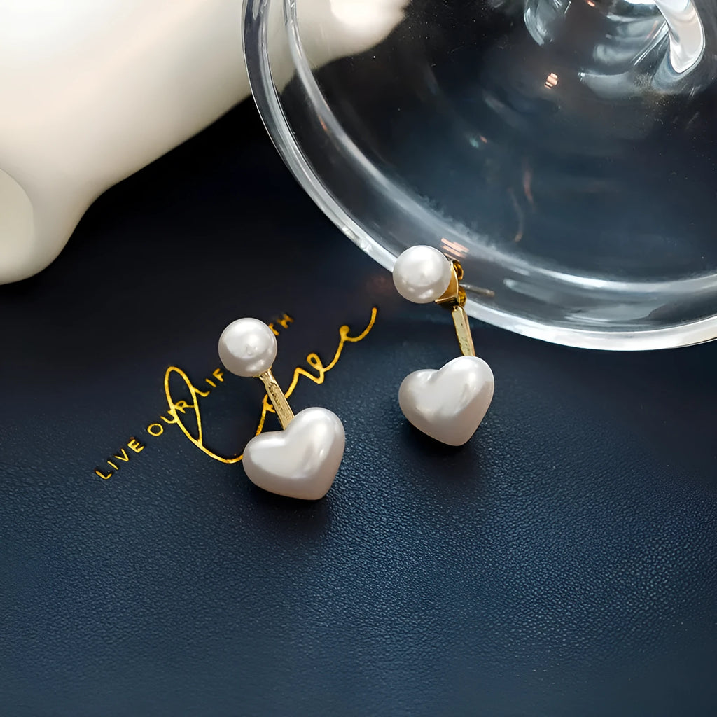 Heart-shaped alloy stud earrings with electroplated finish and inlaid artificial stones.