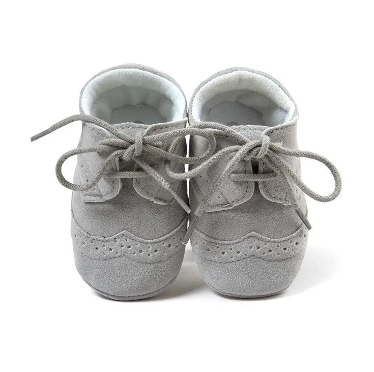 Men's vintage-style baby walking shoes in synthetic leather, shown in light brown colour.
