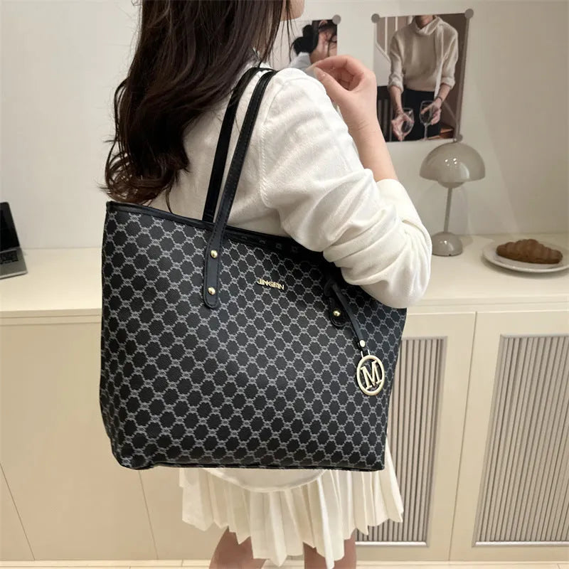 PU leather shoulder bag with sewing thread detail in black, shown with measurements.