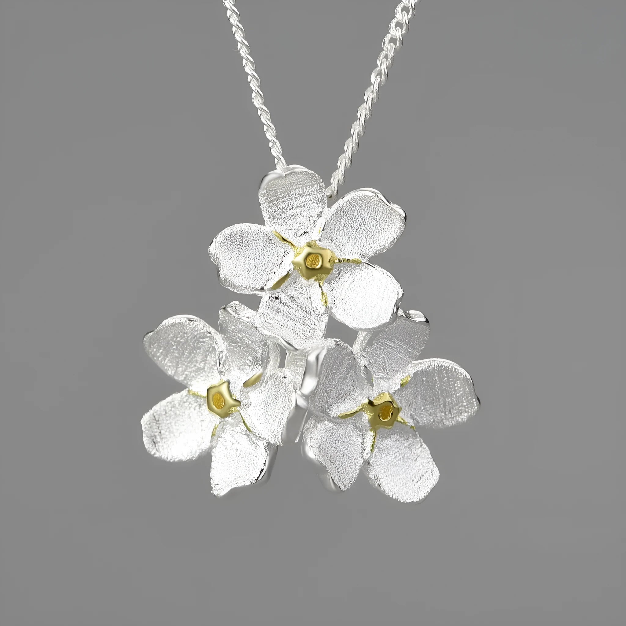 Sterling silver Myosotis sylvatica flower pendant in pastoral style with electroplated finish options