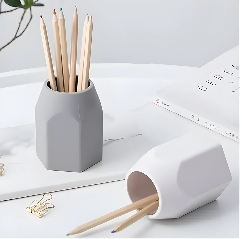 Round silicone pen holder 80x95mm in white on a desk holding pens and pencils