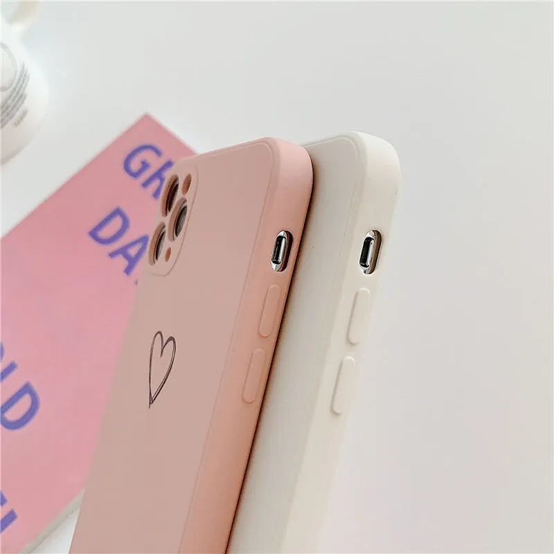 A solid colour silicone phone case for Apple iPhone on a table, showing its slim TPU back cover design.