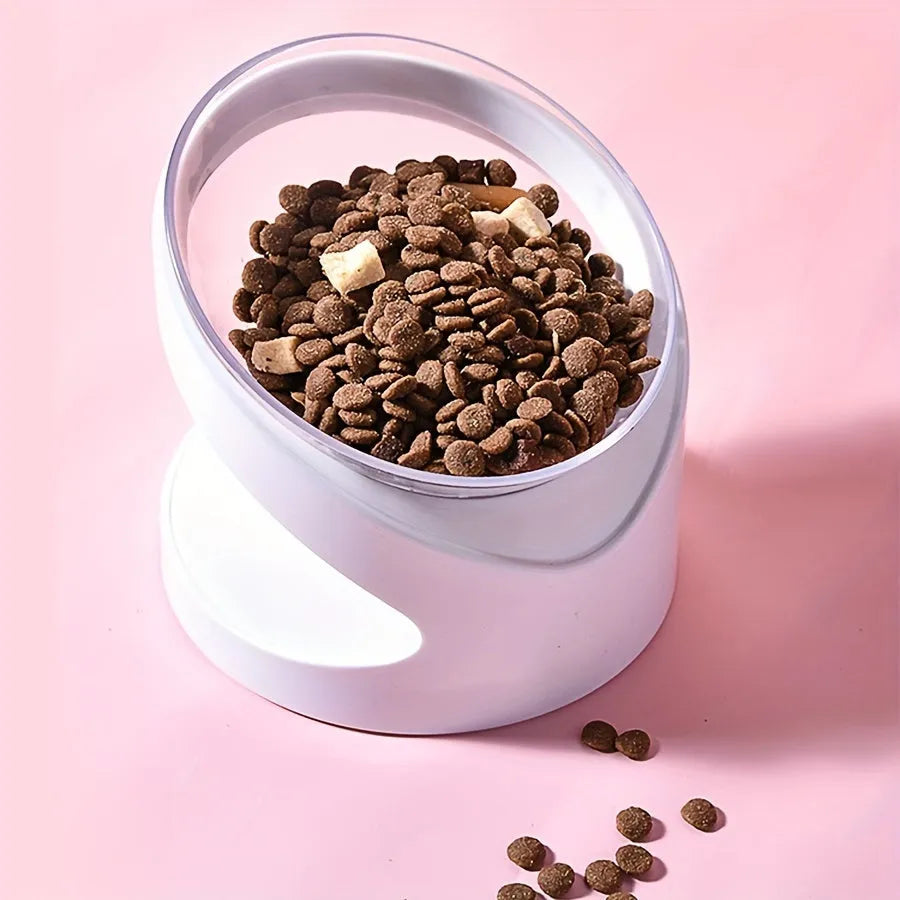 White clear plastic elevated cat food bowl with tilted ergonomic design for neck protection.