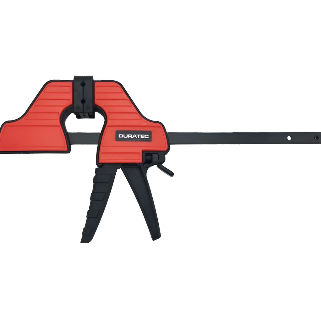 Black plastic woodworking clamp with quick release key and soft rubber grip pads