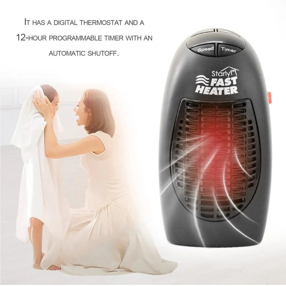 Small black ceramic electric heater with digital display and a rotating plug on a desk.