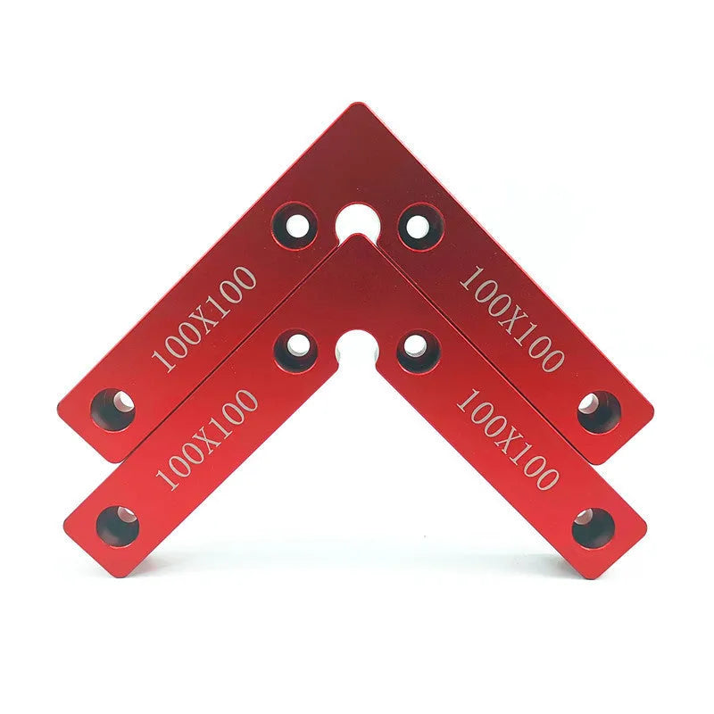 Machined aluminium right angle positioning block for woodworking jigs, showing 90-degree internal corner and scale.