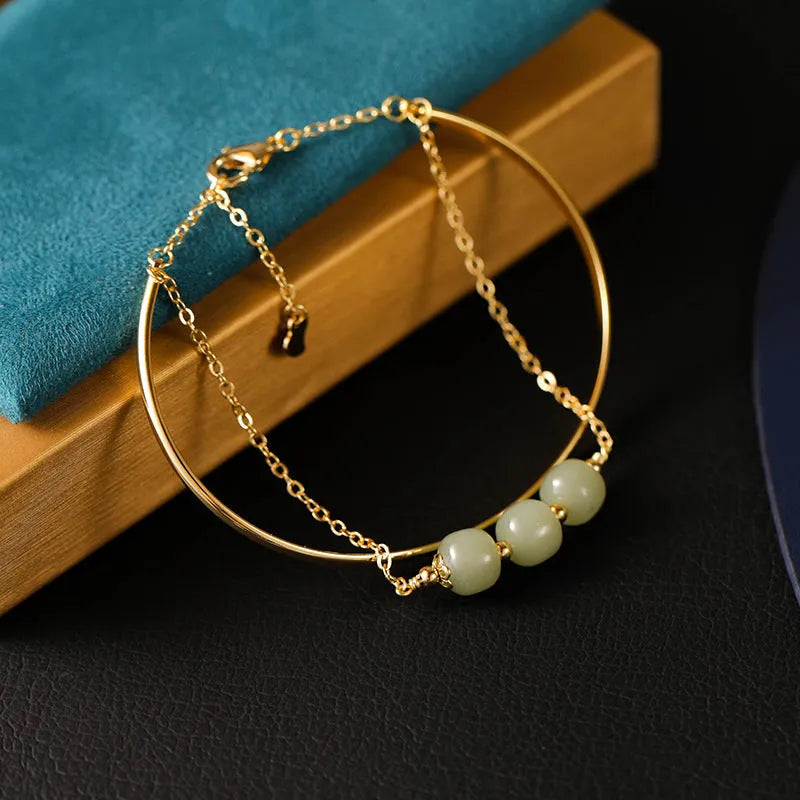 Hetian jade women's bracelet with gold inlay, shown in single, double, and three bead versions.