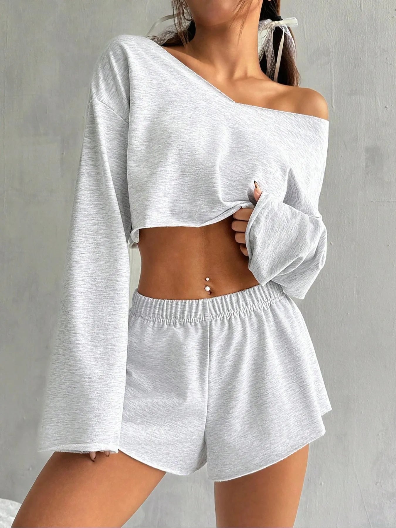 Women's gray cotton long-sleeve blouse and shorts suit set on flat lay
