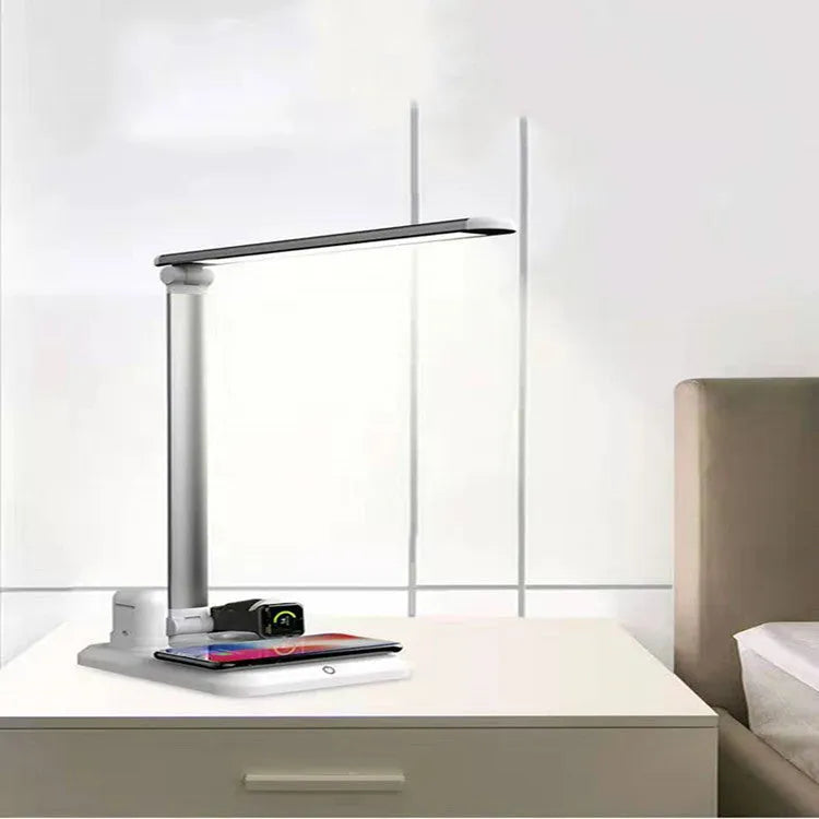 Black or white 4-in-1 LED desk lamp with wireless charging pad and adjustable lighting controls