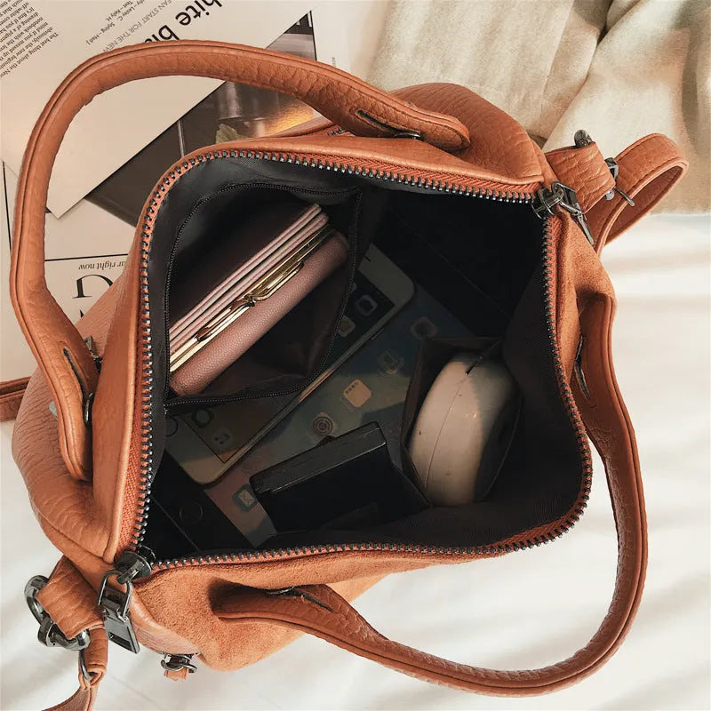 Soft PU leather casual tote shoulder bag with metal zipper in black, brown, or grey.