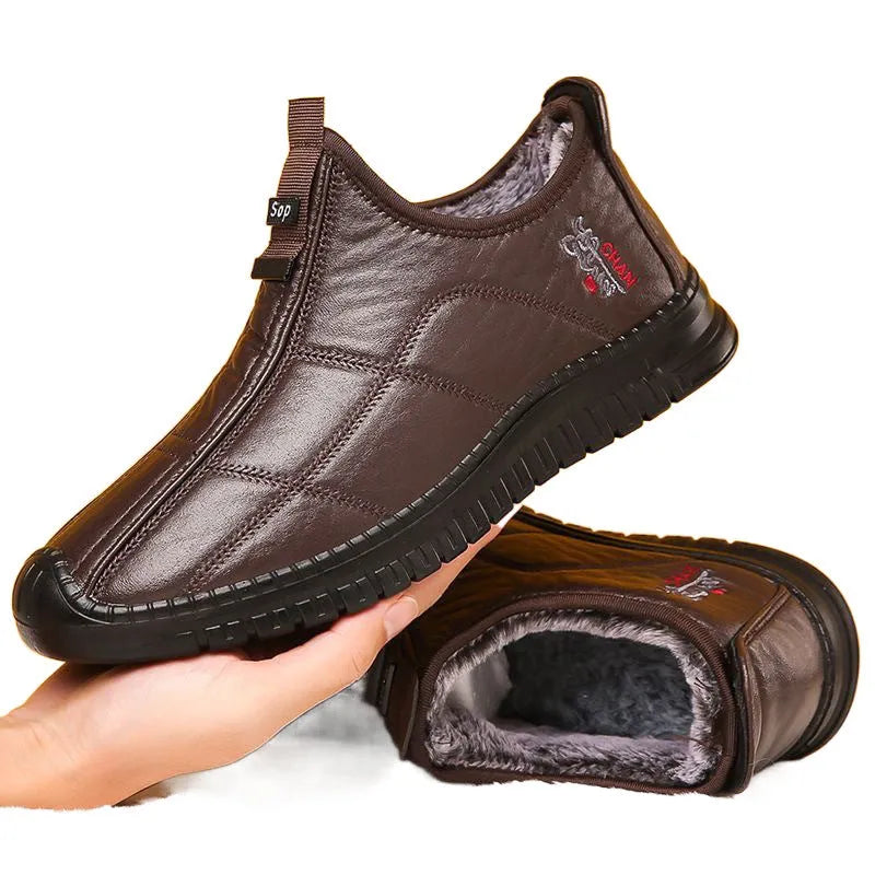 Men's brown winter cotton velvet boots with buckle fastening and a thick non-slip sole.