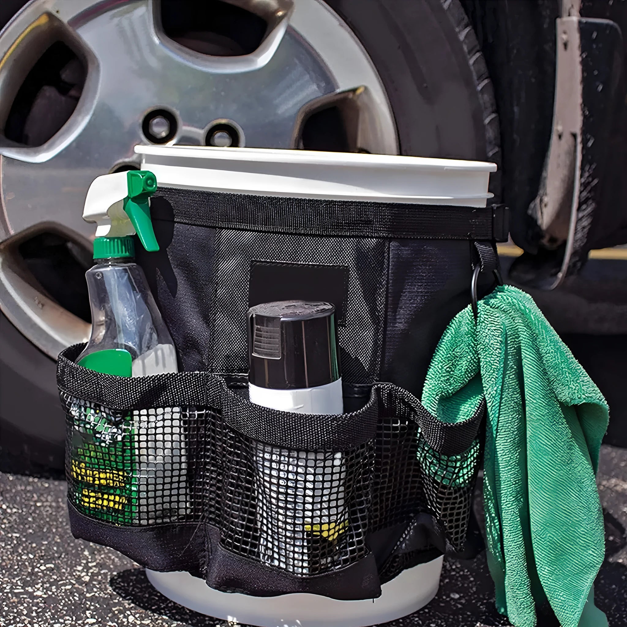 Black cylindrical polyester hanging storage bag designed for a 5-gallon bucket.
