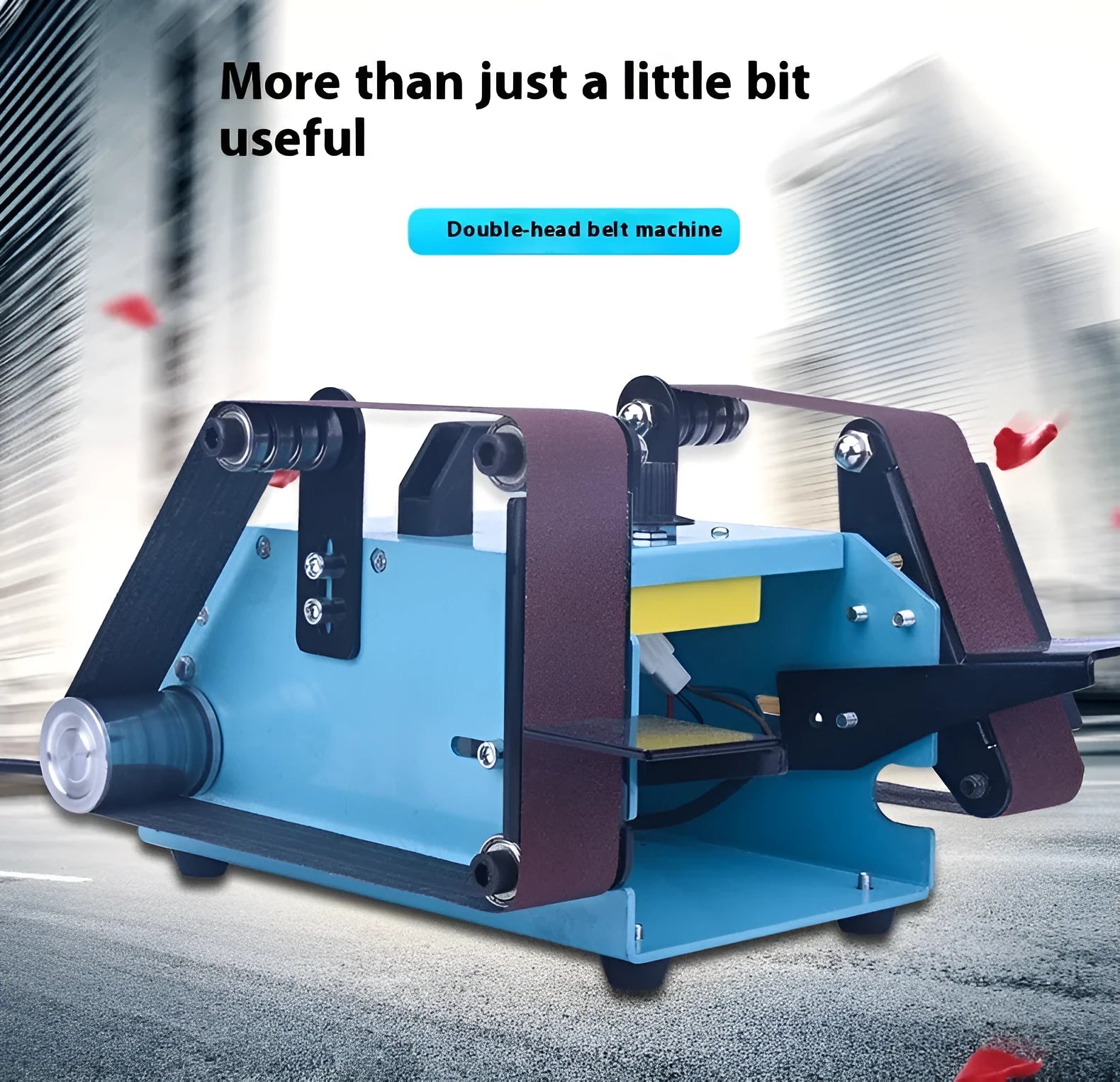 Blue desktop dual-axis belt sander with variable speed switch on a workbench.