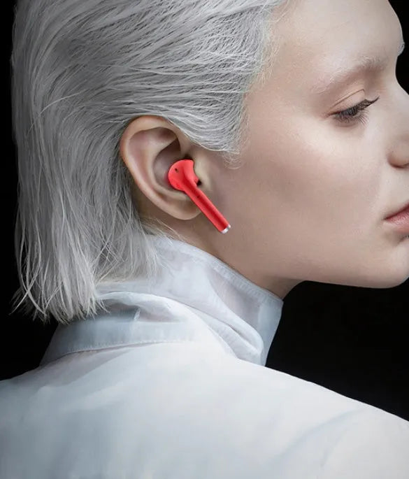 Fashion lipstick-shaped wireless Bluetooth earphones in black, pink, purple, and white colours with charging case