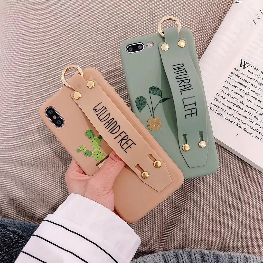 Green graffiti design wristband holder phone case for iPhone shown from the back.