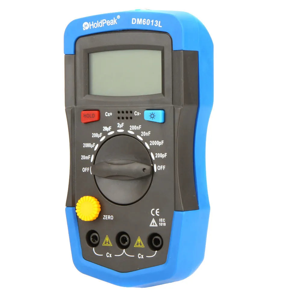 DM6013L handheld digital capacitance meter with LCD backlight, test leads, and display showing measurement