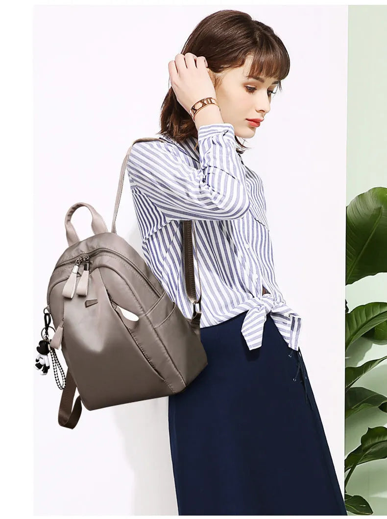 Bear large Oxford cloth backpack for women in black with belt decoration and double straps