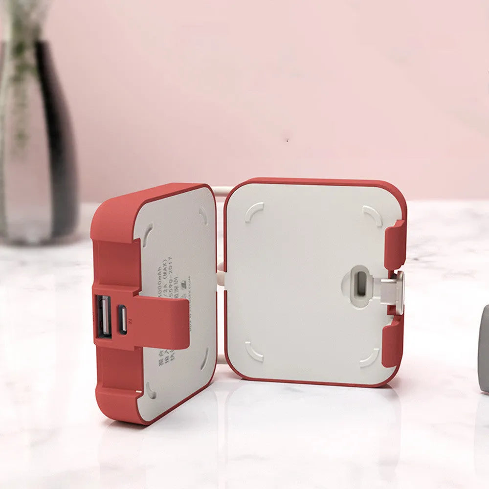 Handbag back clip power bank in blue, showing clip and dual USB charging ports