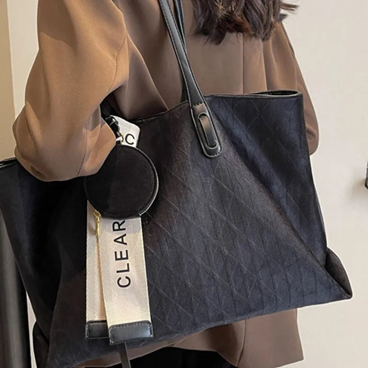 Large soft polyester shoulder tote bag in horizontal square shape with zippered internal compartment