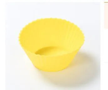 Twelve reusable silicone cupcake liners in six colours, two cups per colour, with a nonstick surface.