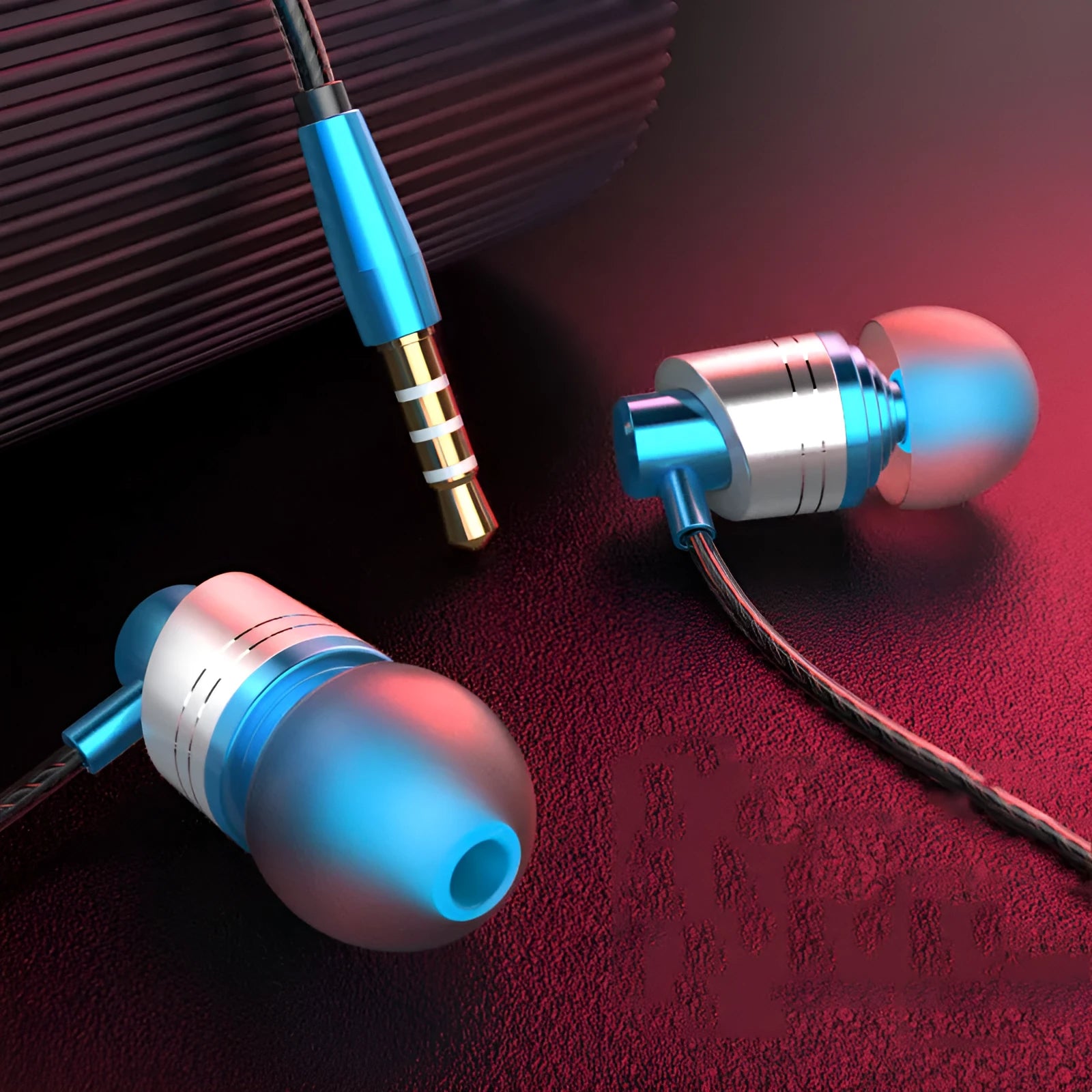 Wired in-ear headphones with microphone on black, blue, and red TPE cable connected to a 3.5mm plug.