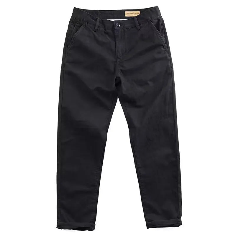 Men's slim fit casual trousers in a grey washed fabric with a straight leg.